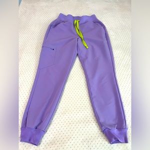 Figs' high-waist jogger pants in size XS/Petite with a small pen stain on front.